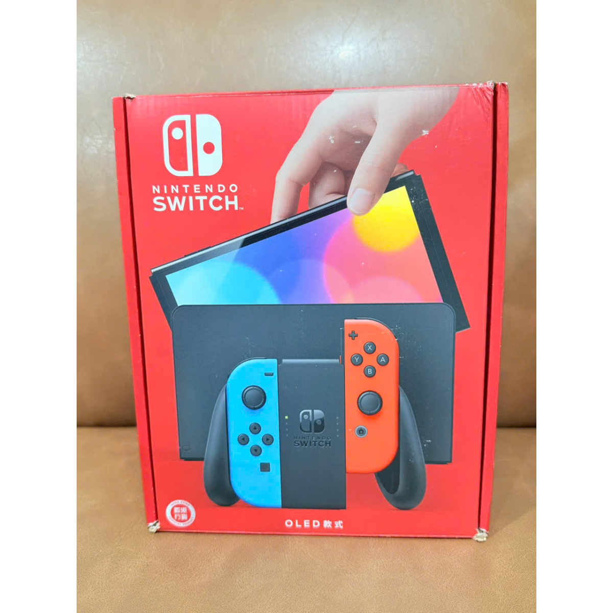 Nintendo Switch OLED model with Neon Red Blue Joy‑Con Like New